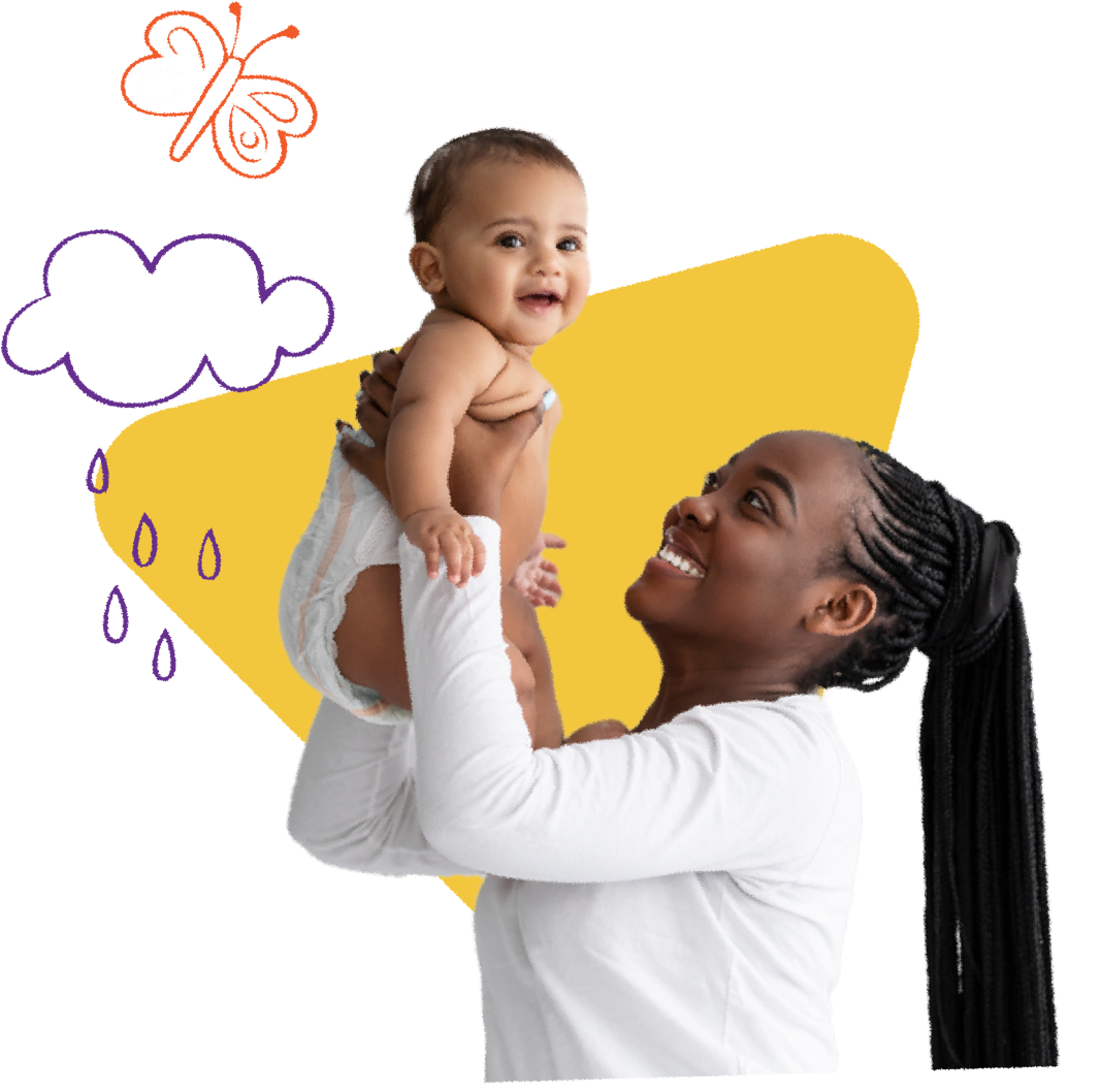 Parent joyfully lifting a laughing baby into the air